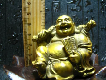 В Китае можно собирать изделия ручной работы из латуни, статую Будды Майтрейи, украшения из металла ручной работы Изображение
